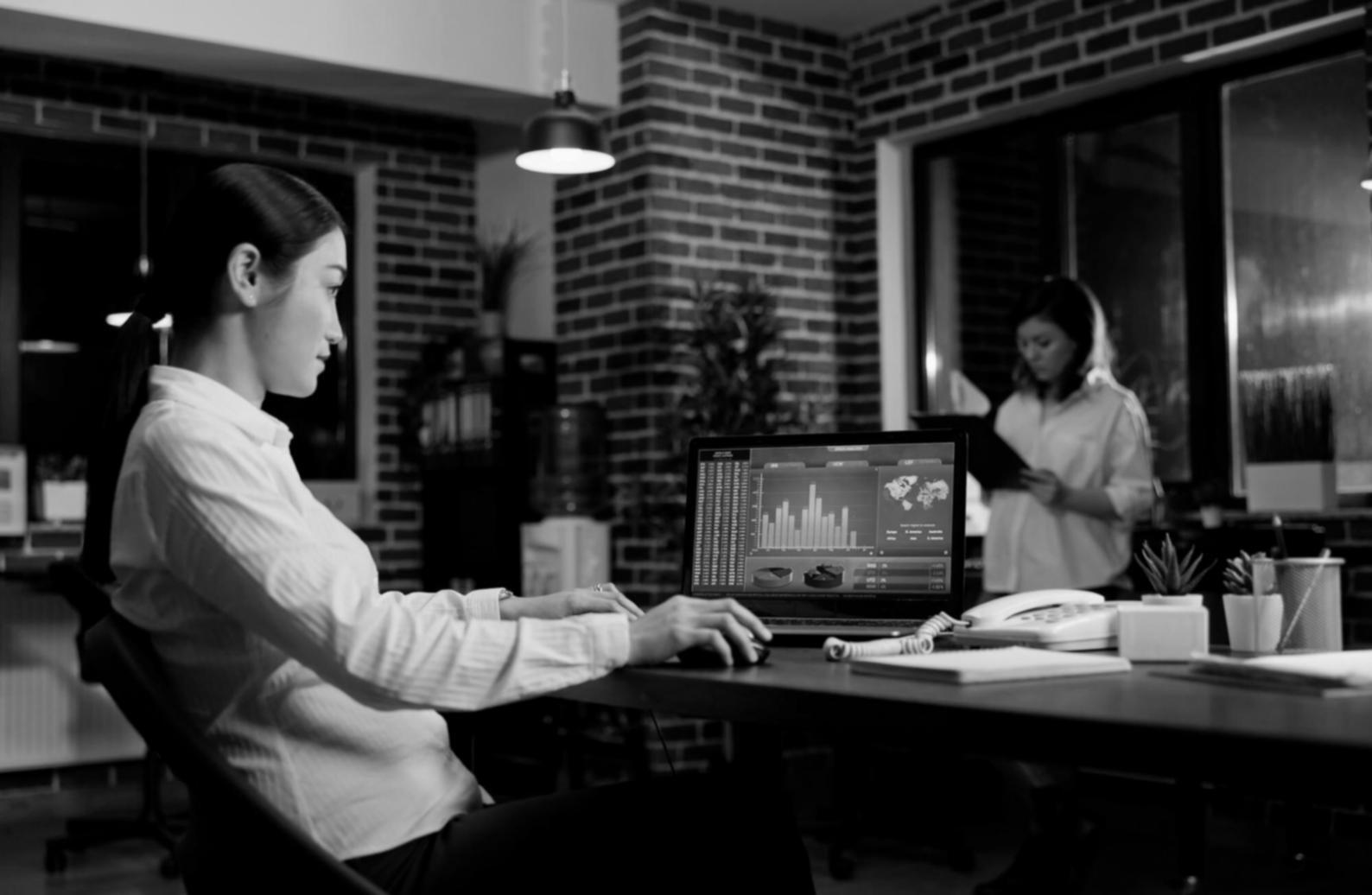 Modern workspace with strategic planning materials and digital marketing tools